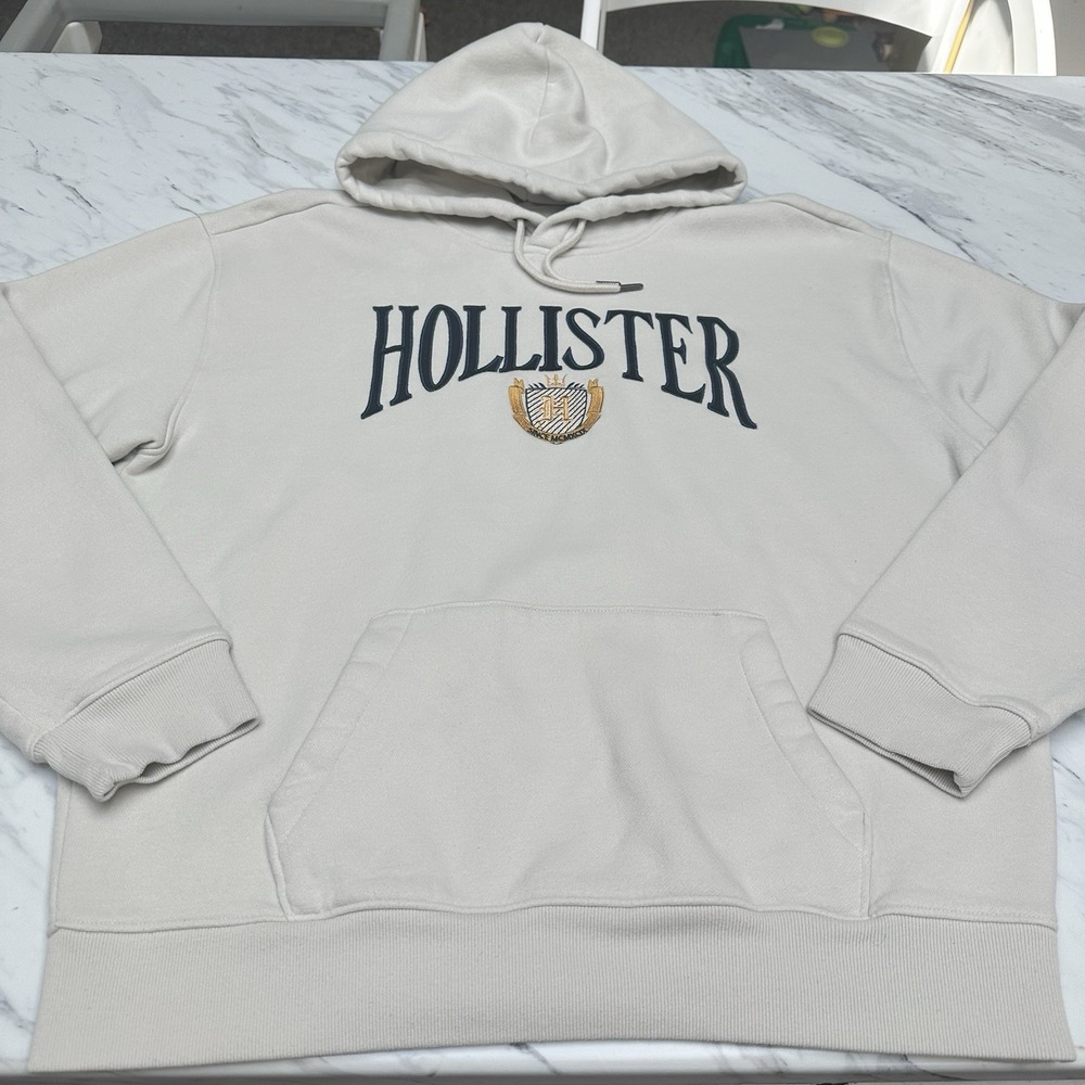 Hollister Men's Relaxed Fit Hoodie Size L Cream Navy Blue Logo Preppy College